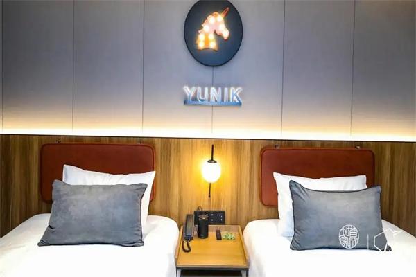 yunik酒店加盟费用要多少钱？加盟电话是多少？